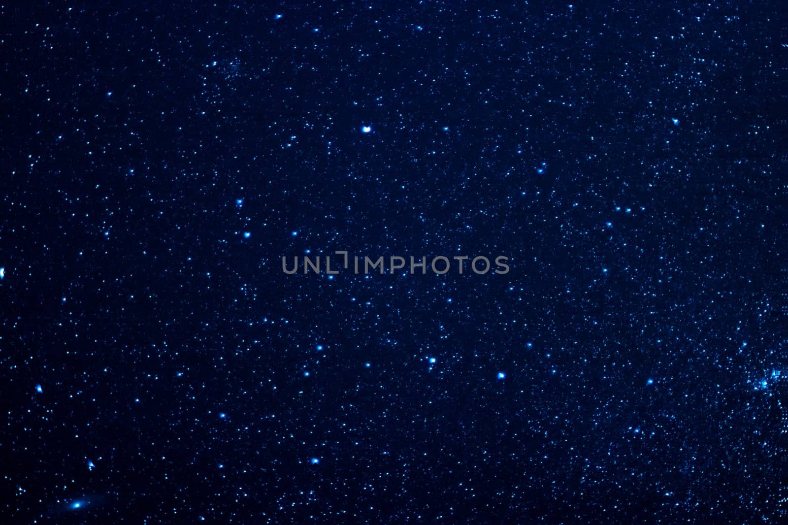 abstract background with a starry dark blue night sky