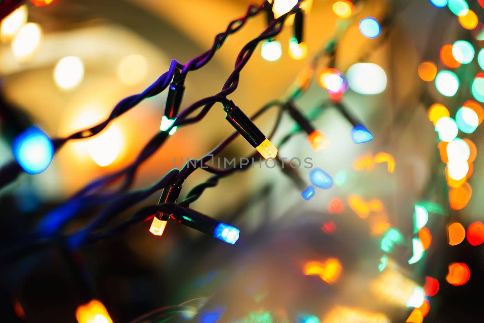 Christmas garlands with colorful lights decorate the decor for new year