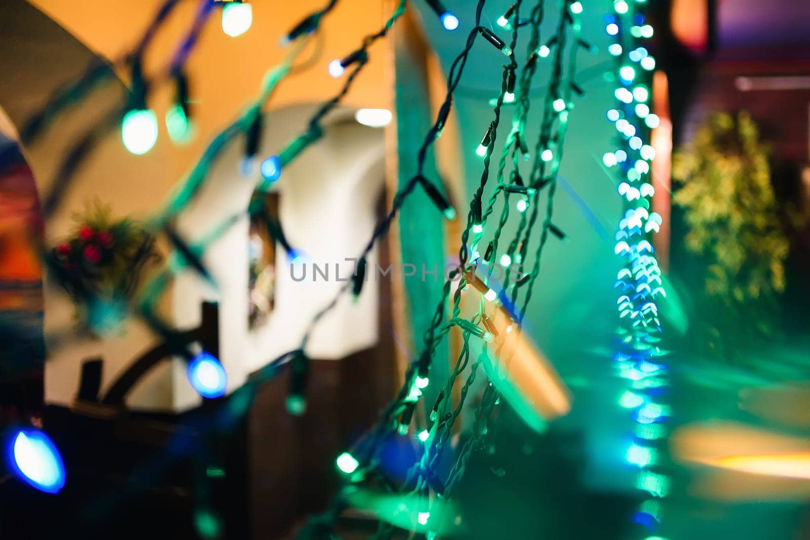 Christmas garlands with colorful lights decorate the decor for new year