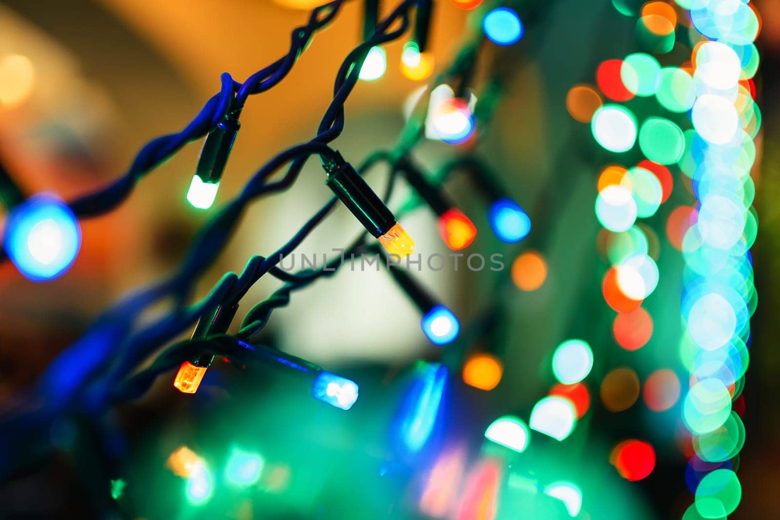 Christmas garlands with colorful lights decorate the decor for new year