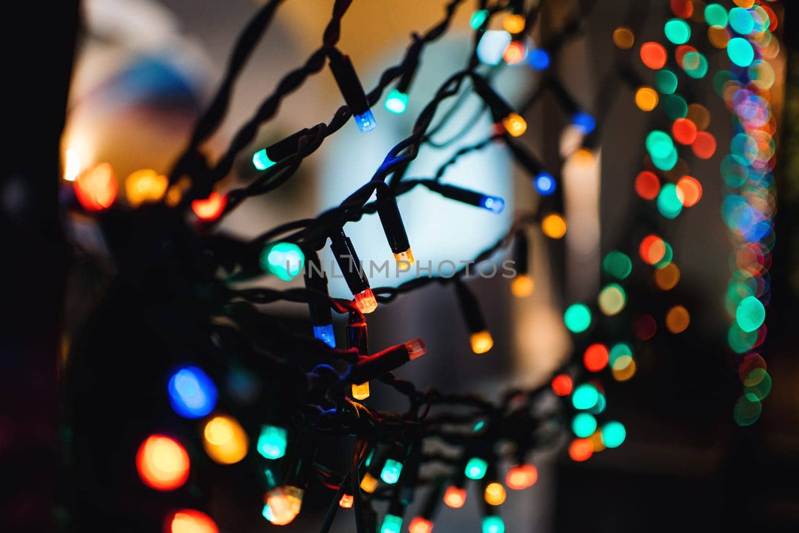 Christmas garlands with colorful lights decorate the decor for new year