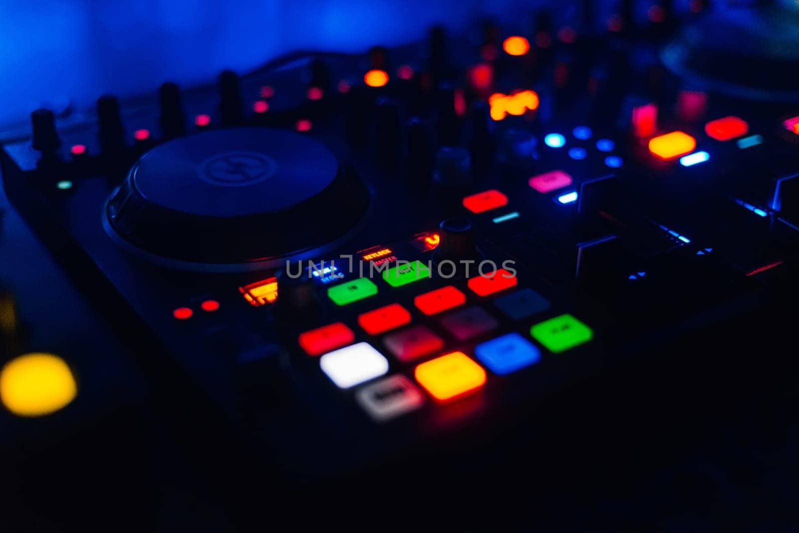 luminous button on the control panel the DJ for mixing and disk management