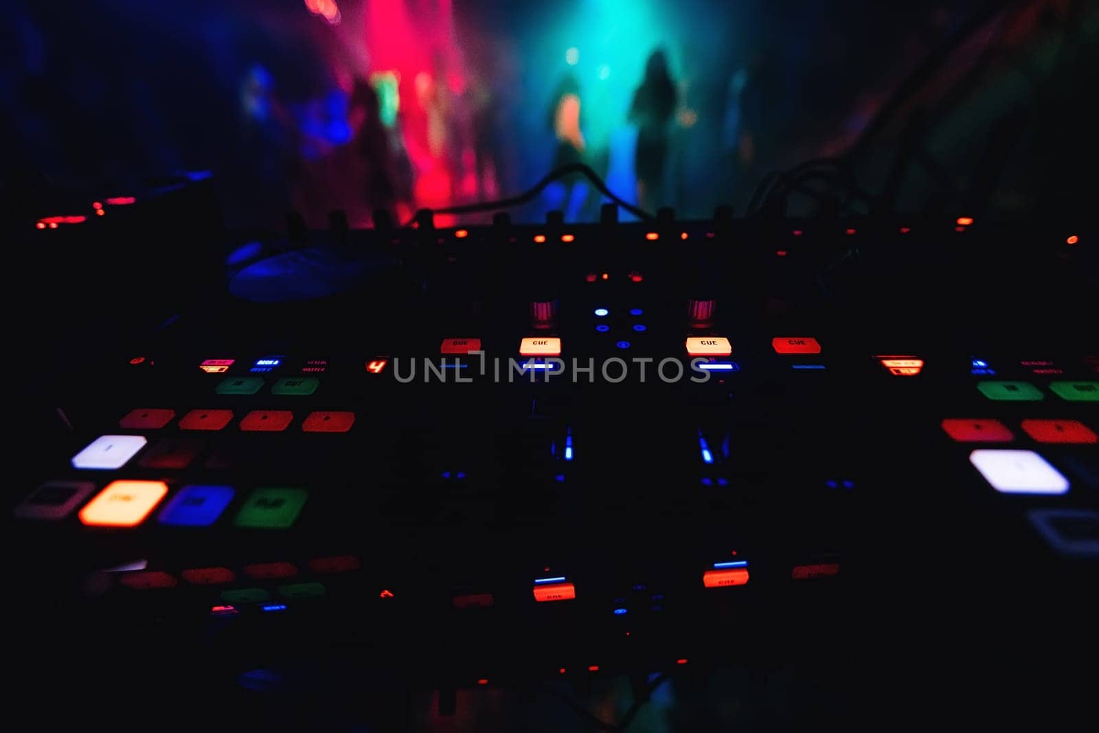 mixer control DJ in a nightclub to control the music at the party