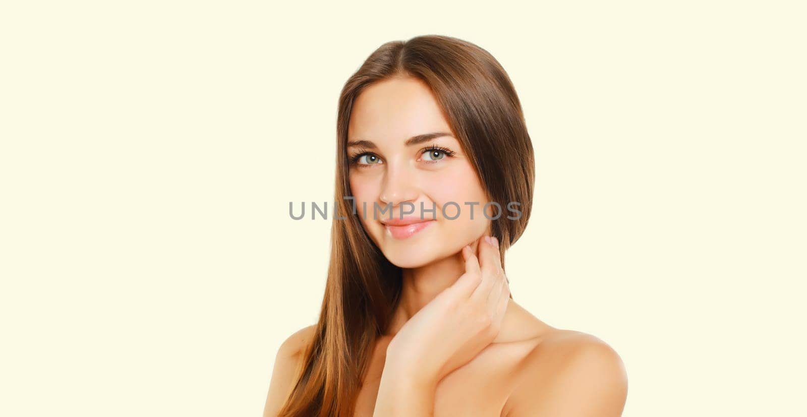 Beauty portrait of brunette young woman on white studio background by Rohappy