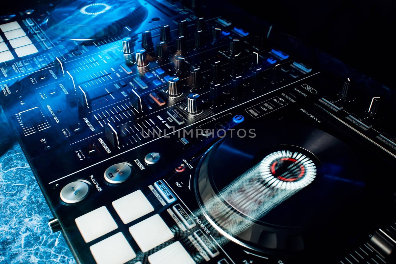 modern professional equipment for DJ to mix music with light effects