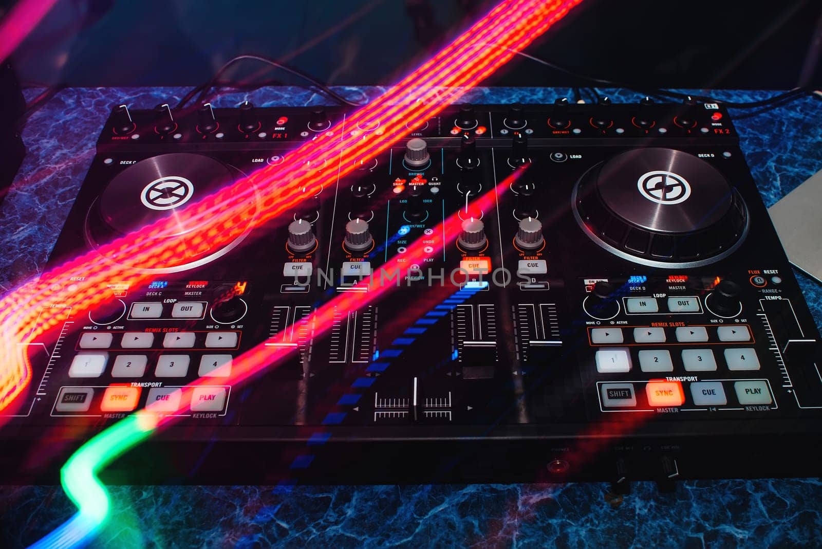 modern professional DJ Board with colorful effects for games and music mixing on the table