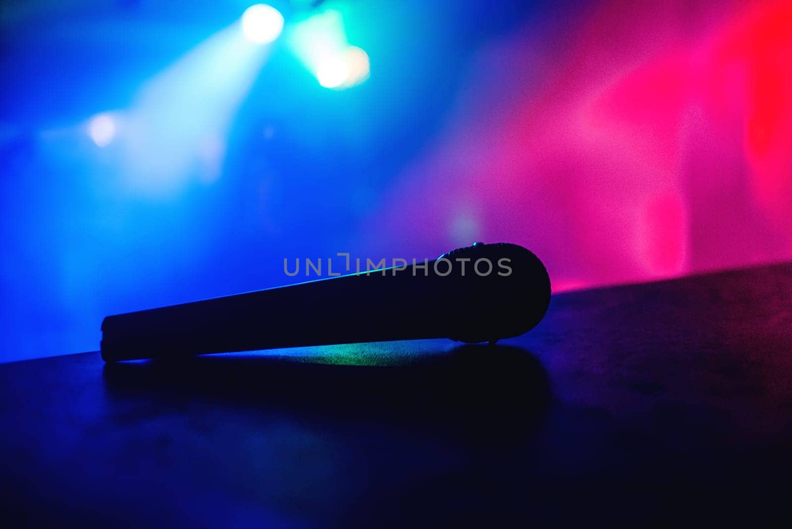 professional microphone in the booth at party in a nightclub