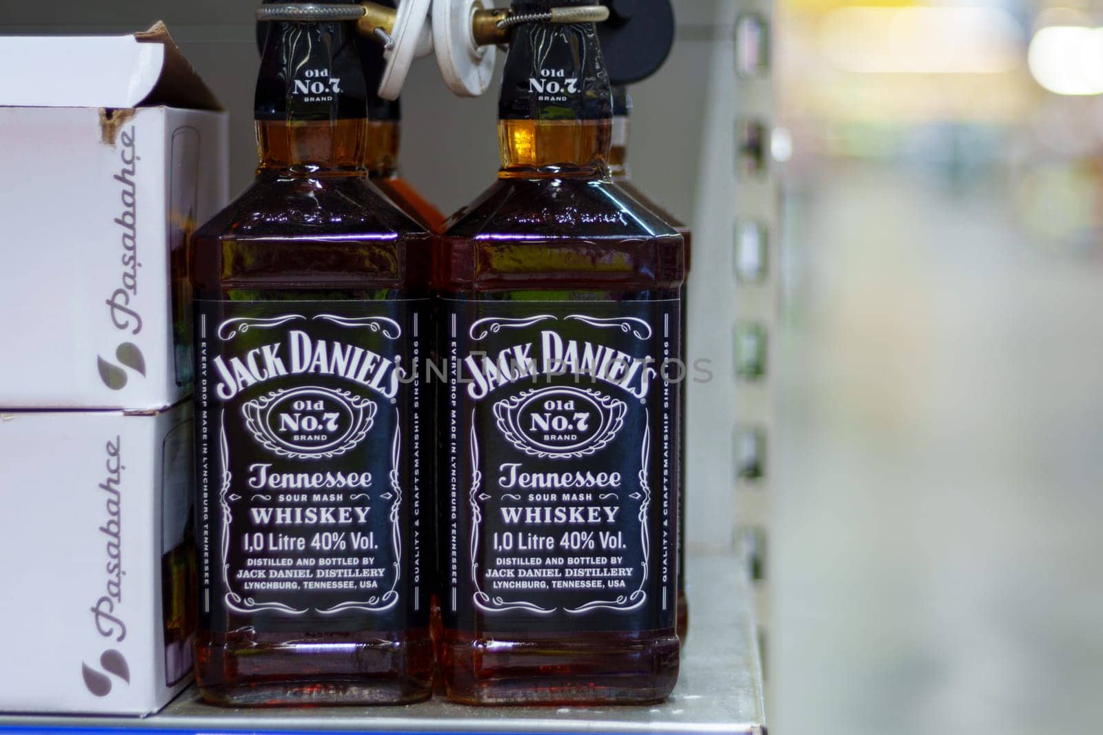 Tyumen, Russia-March 02, 2024: Bottles of Jack Daniels Tennessee Whiskey are showcased prominently on a retail shelf.