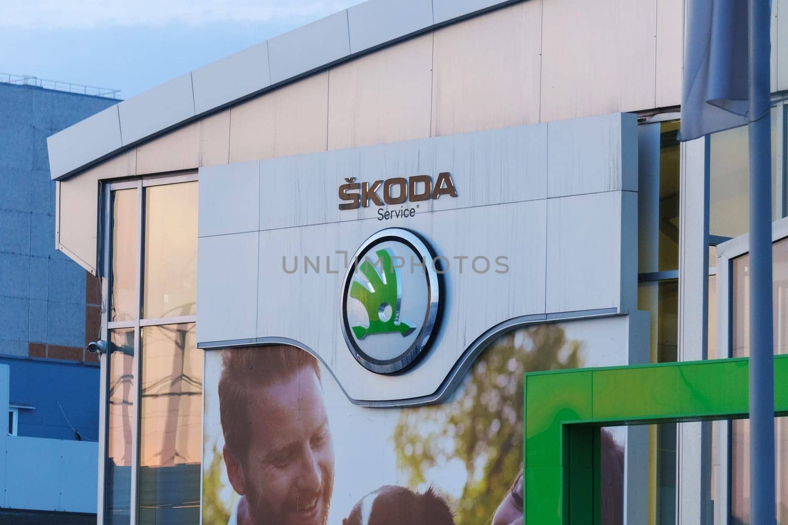 Tyumen, Russia-March 18, 2024: Skoda logo car advertisement on its side, showcasing the brands logo and vehicle model.