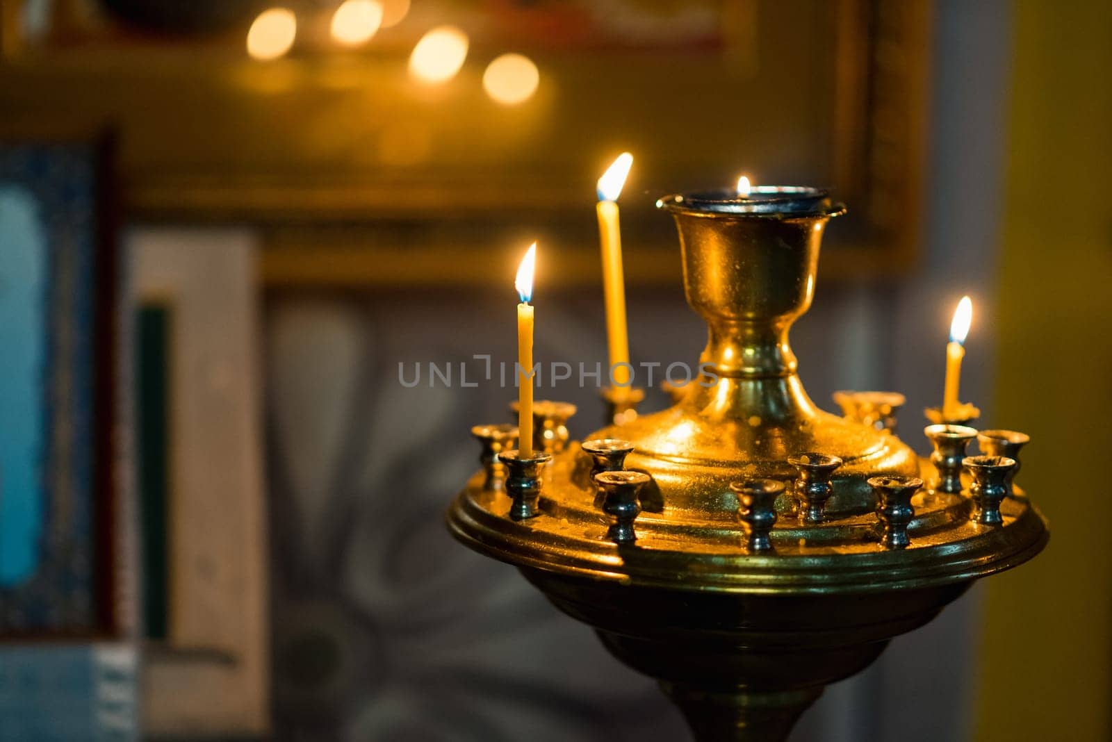 burning candles at the altar in Christian Orthodox church