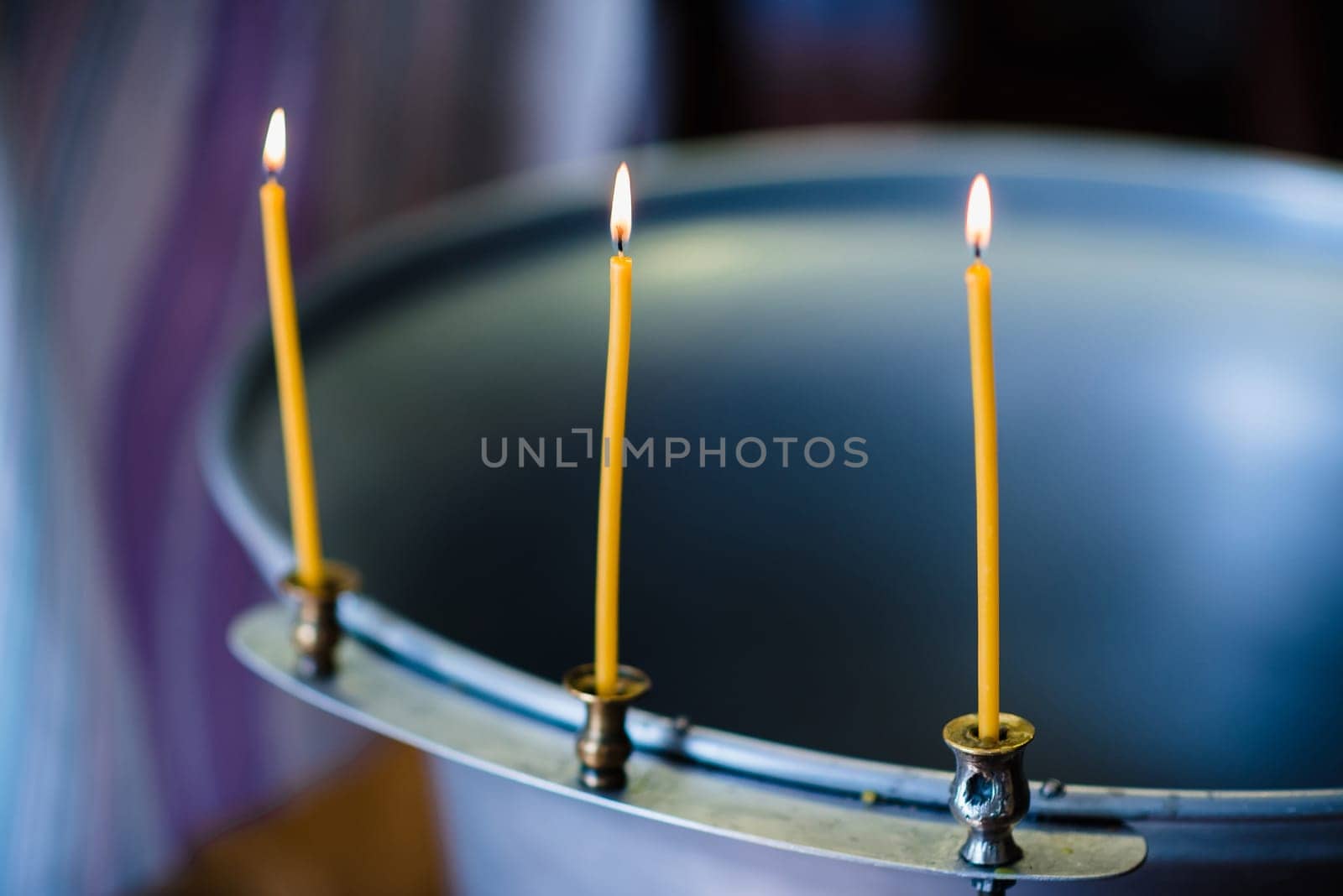 burning candles at the altar in Christian Orthodox church