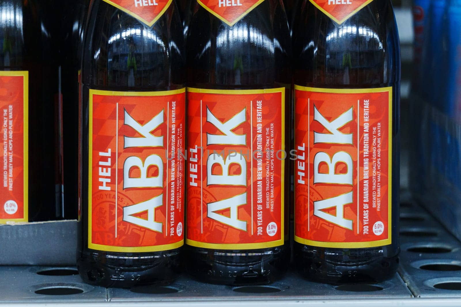 Tyumen, Russia-March 02, 2024: ABK lager beer bottles close up supermarket shelf