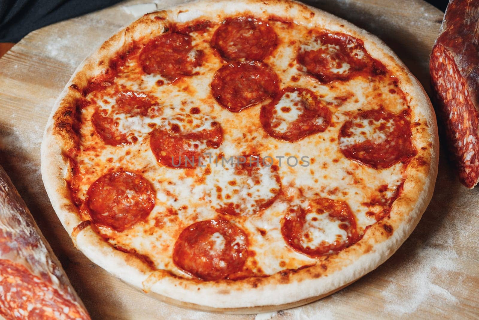 A mouthwatering pepperoni pizza sits on a rustic wooden cutting board, the cheesy goodness waiting to be devoured.