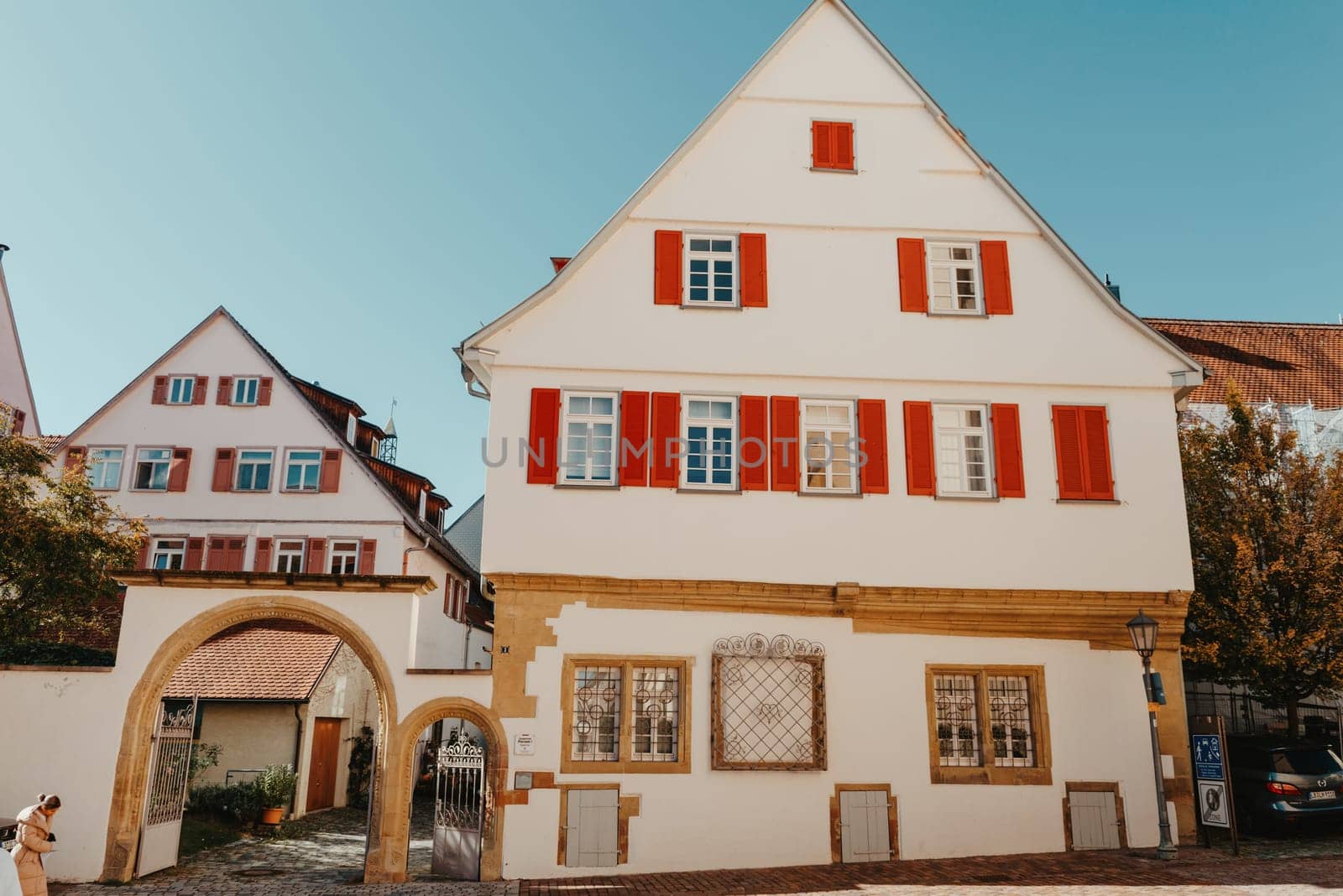 Old national German town house. Old Town is full of colorful and well preserved buildings. Baden-Wurttemberg is a state in southwest Germany bordering France and Switzerland. The Black Forest, known for its evergreen scenery and traditional villages, lies in the mountainous southwest. Stuttgart, the capital, is home to Wilhelma, a royal estate turned zoo and gardens. Porsche and Mercedes-Benz have headquarters and museums there. The 19th-century Hohenzollern Castle sits in the Swabian Alps to the south.