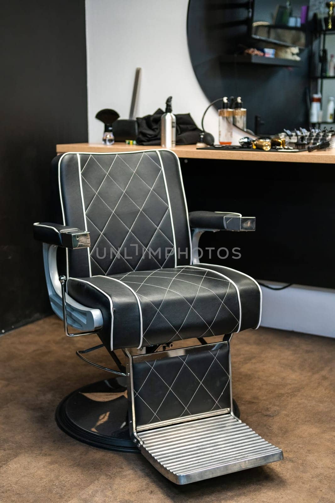 Stylish modern barber chair in the barbershop by vladimka