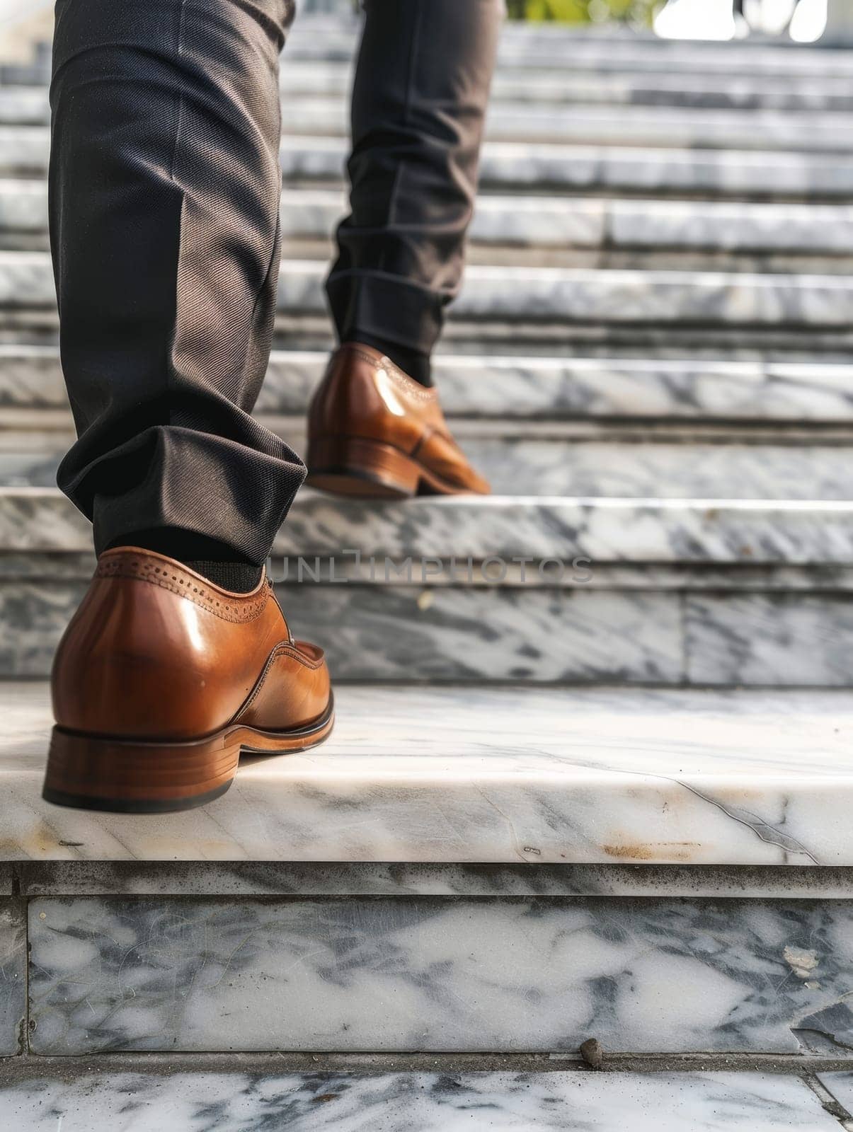 Close-up of a persons feet in polished brown dress shoes, ascending marble steps, capturing a moment of upward mobility