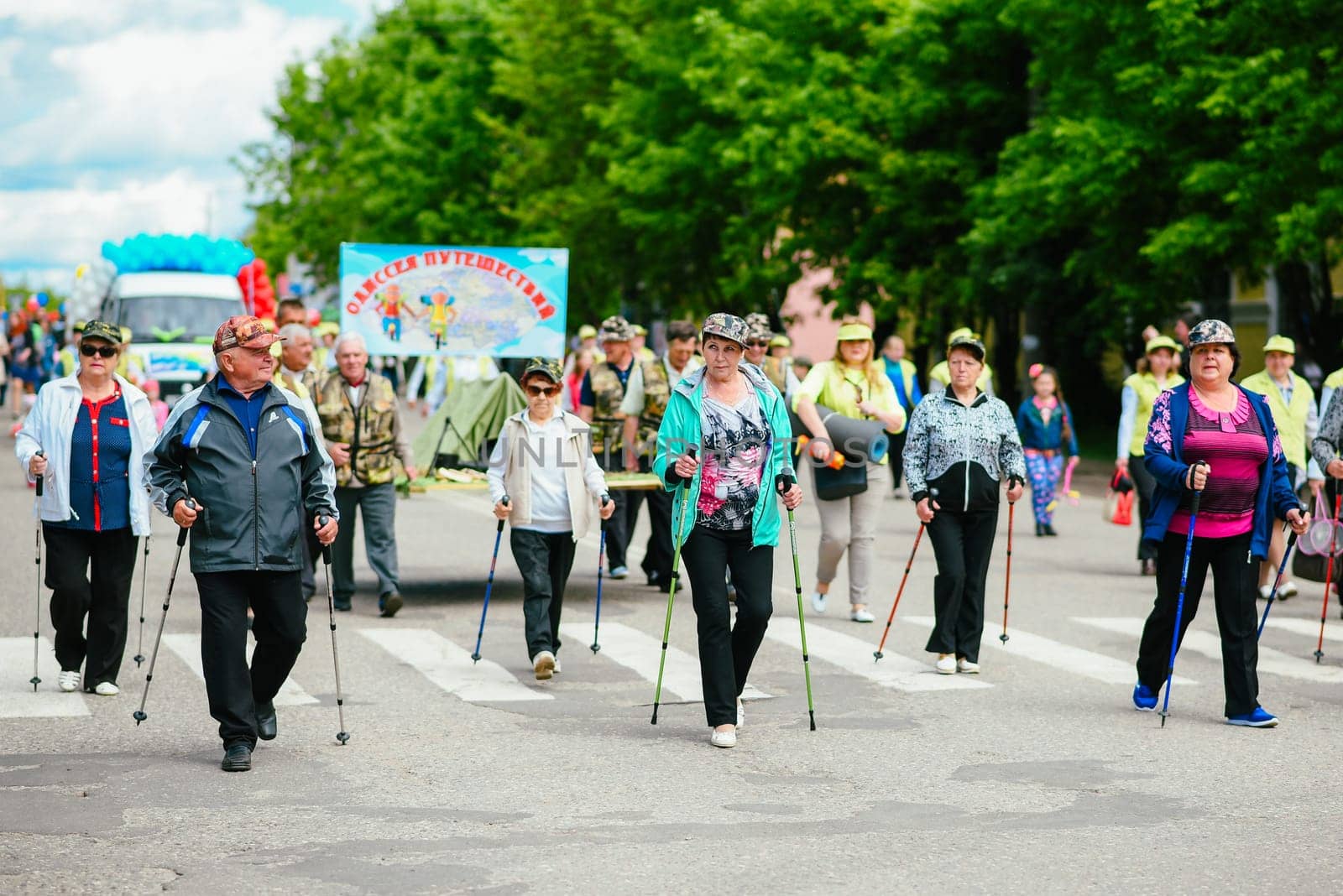 VICHUGA, RUSSIA - JUNE 24, 2017: Festive procession of people on the street on the Day of Vichuga, Russia
