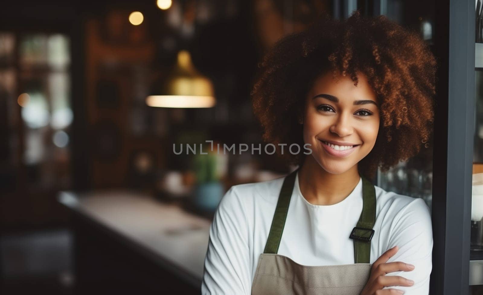Portrait of happy smiling African woman barista, coffee house or cafe worker, young waiter working in coffee shop, looking at camera
