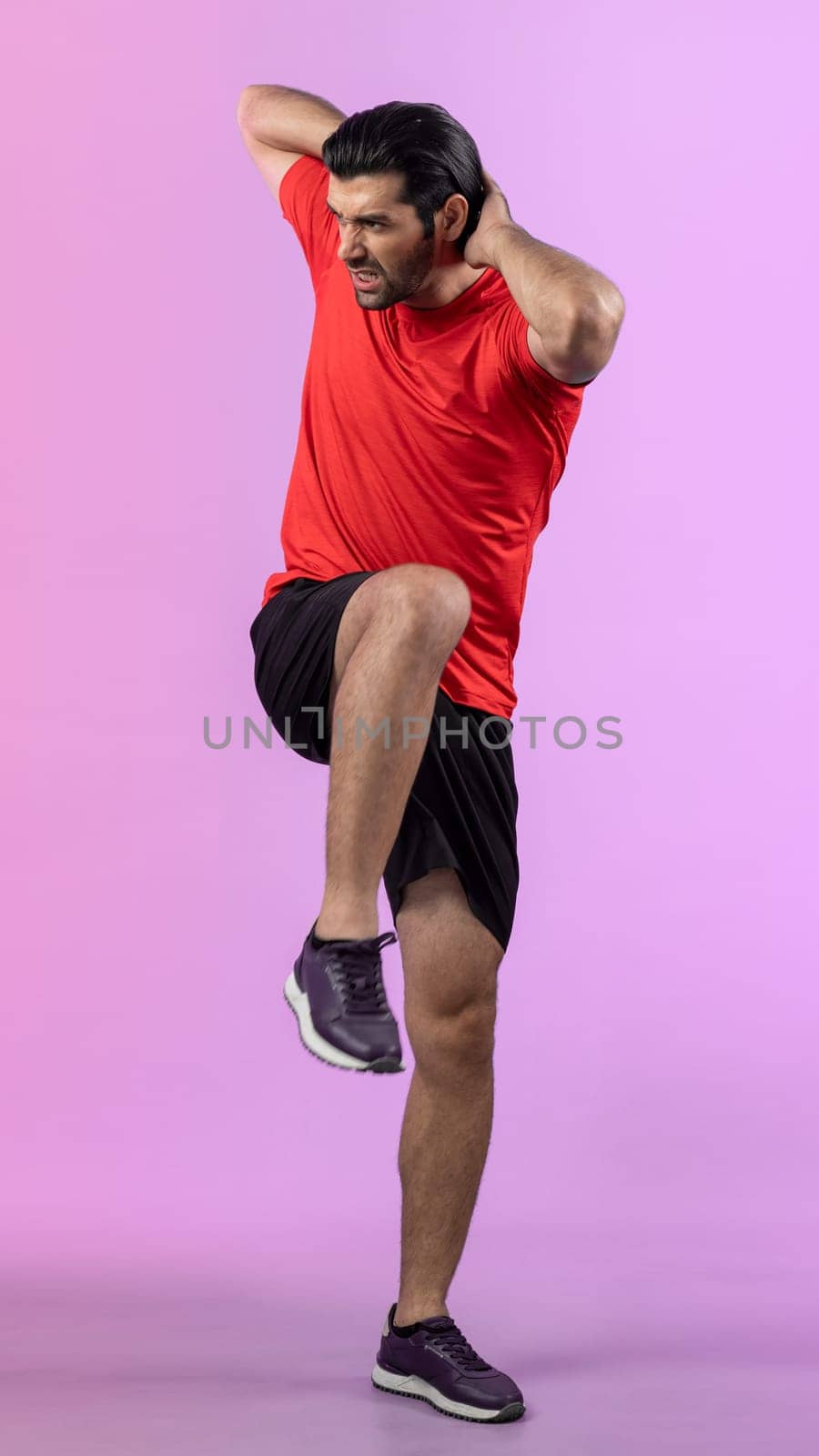 Full body length gaiety shot athletic sporty man with warmup posture by biancoblue