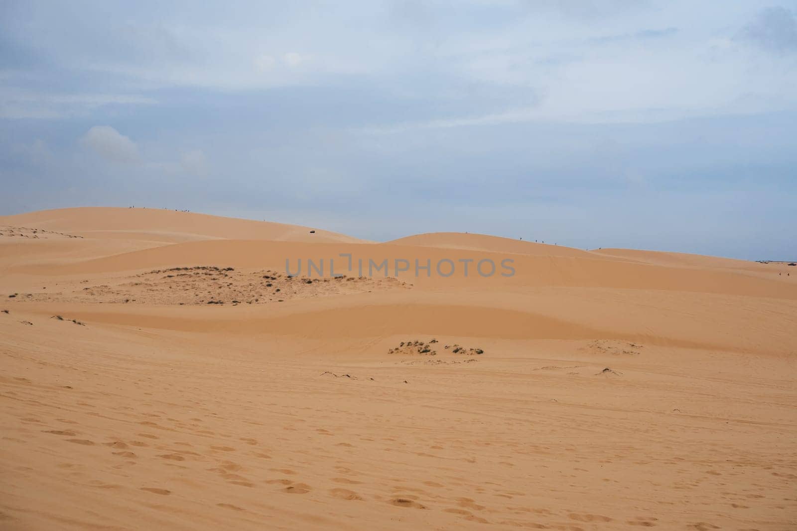 White Sand Dunes Muine in Vietnam with tourists in the summer