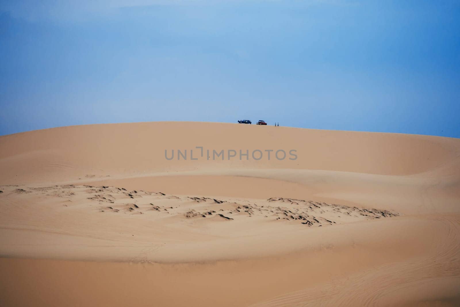 White Sand Dunes Muine in Vietnam with tourists in the summer