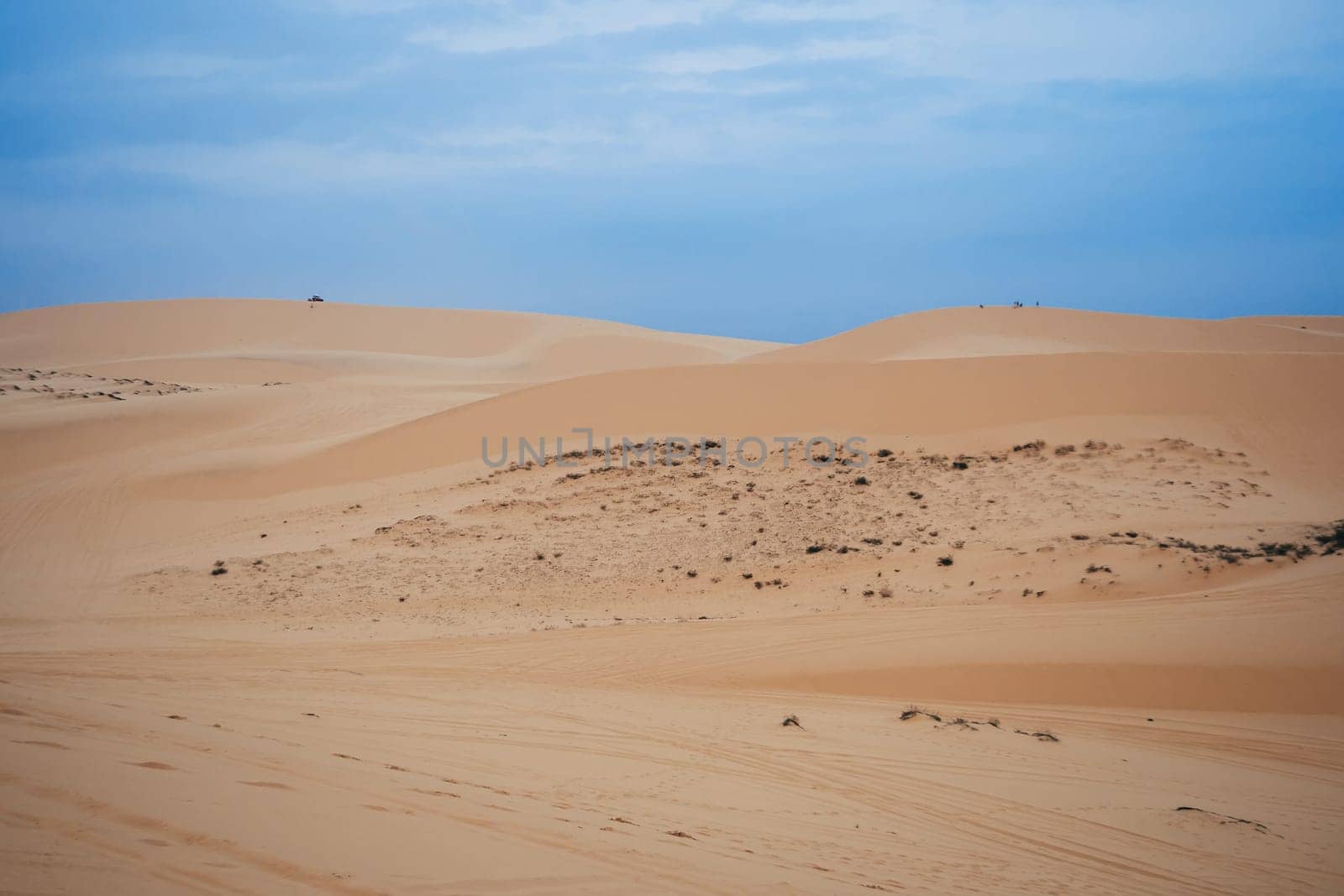 White Sand Dunes Muine in Vietnam with tourists in the summer