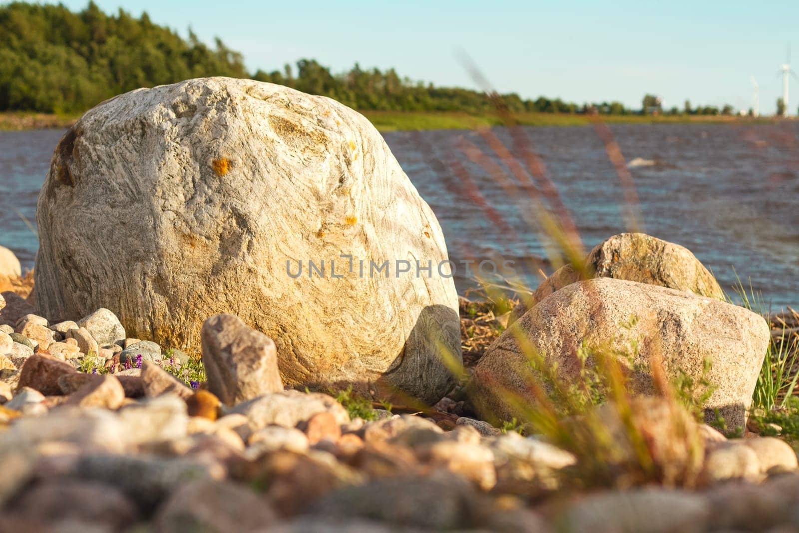 large stone lies on the seashore, wild nature