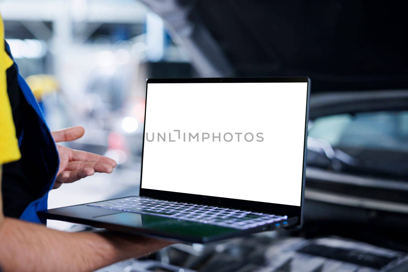 Man checks woman car with mockup laptop by DCStudio