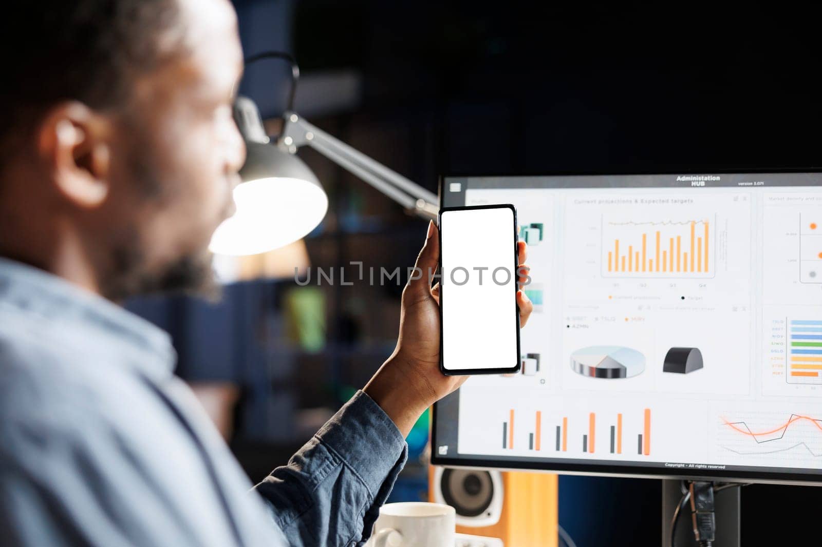 Male researcher ready to create new financial statement for the accounting staff, examining white screen on smartphone. Employee presenting blank layout while working with company statistics.