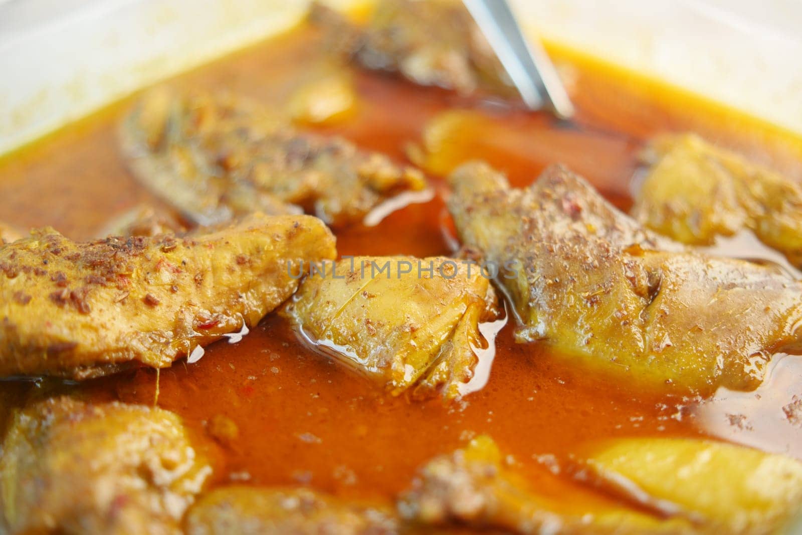 Chicken curry or masala in a bowl on table by towfiq007