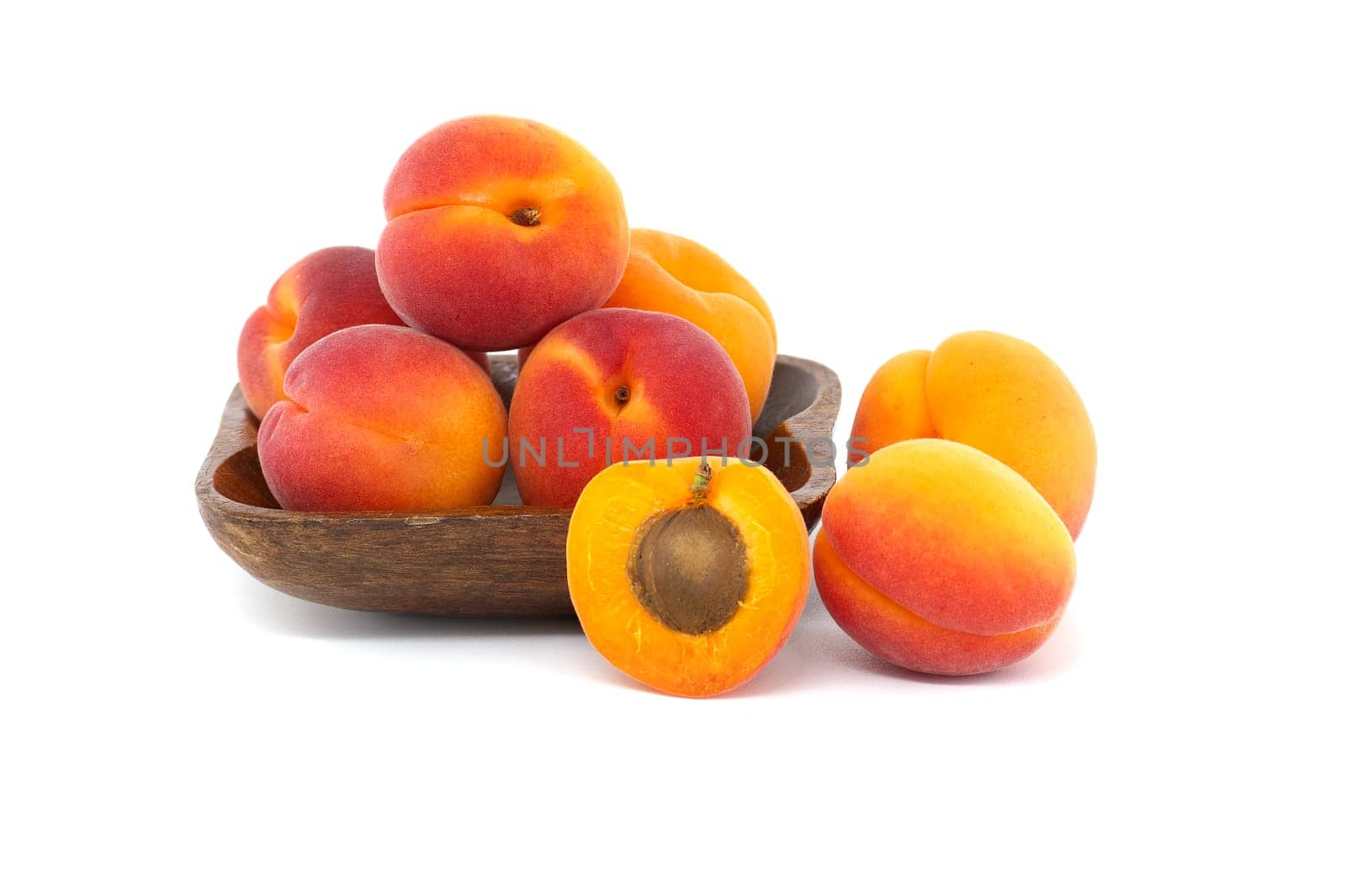 Group of fresh apricots isolated on a white background by NetPix