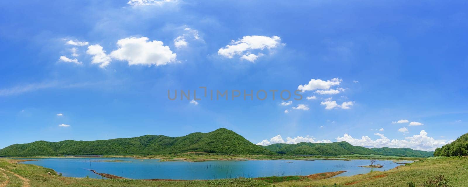 Mountains landscape, Beautiful Sunny day in countryside, lake and blue sky