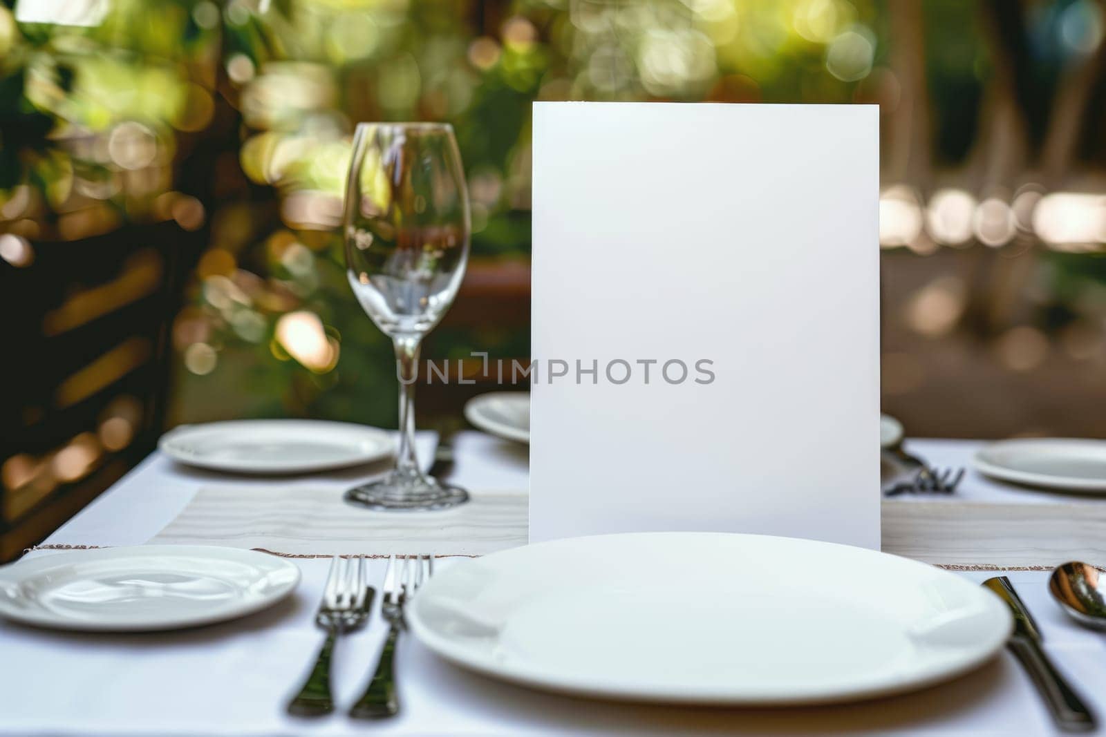 Outdoor dining setup with empty white menu on a rustic wooden table, elegant tableware and nature background. For restaurant and alfresco dining concept with copy space. Ai generation. High quality