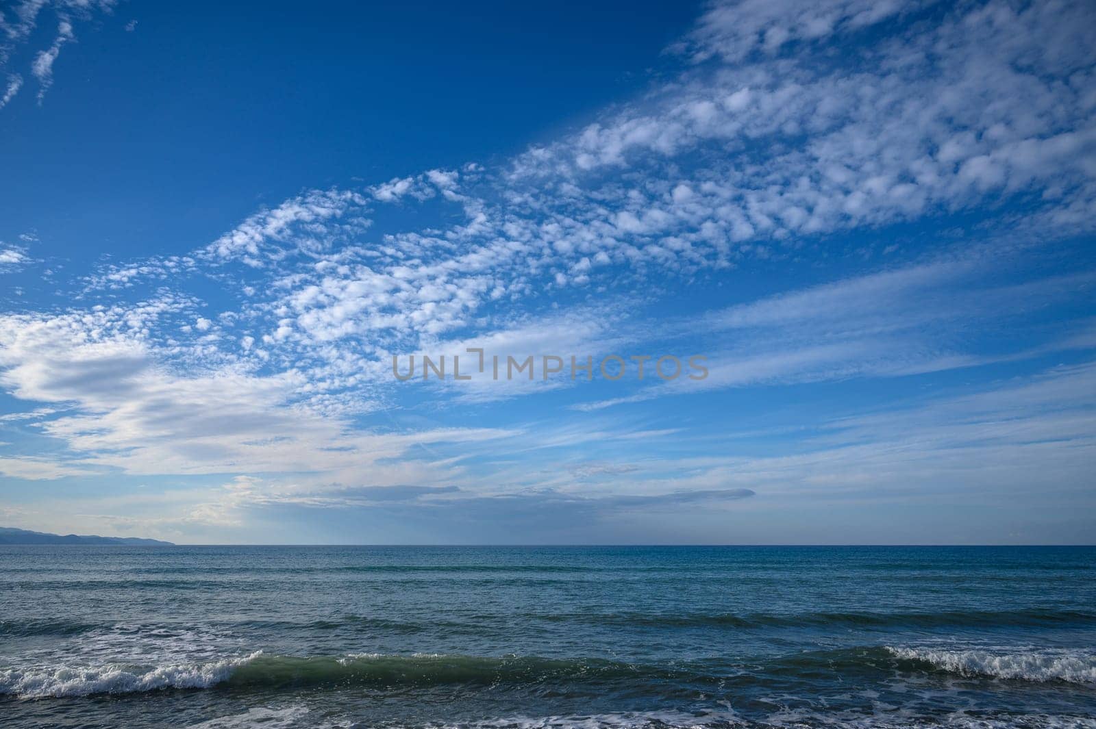 Cloudy sky over Mediterranean Sea by Mixa74