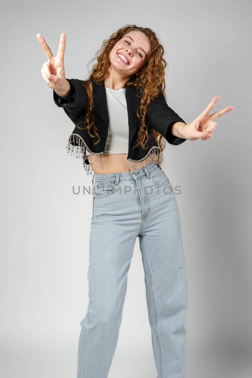 Woman Making a Peace Sign With Hands close up