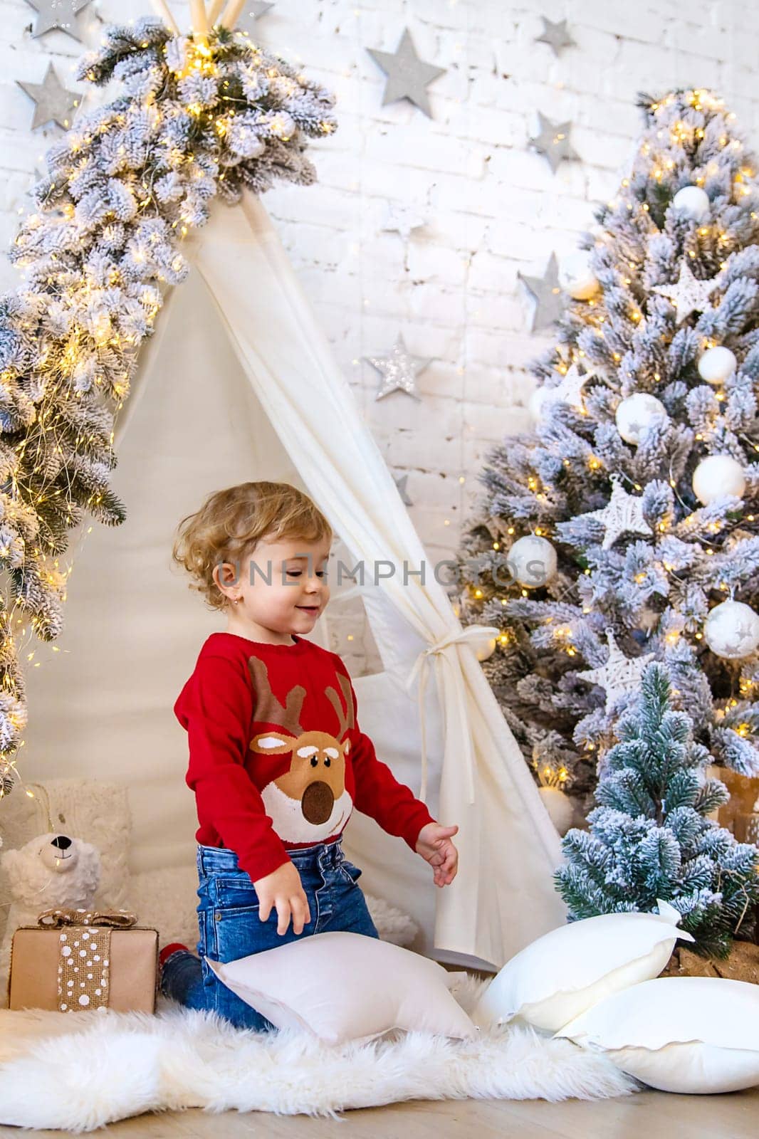 Child in his room decor christmas. Selective focus. Kid.
