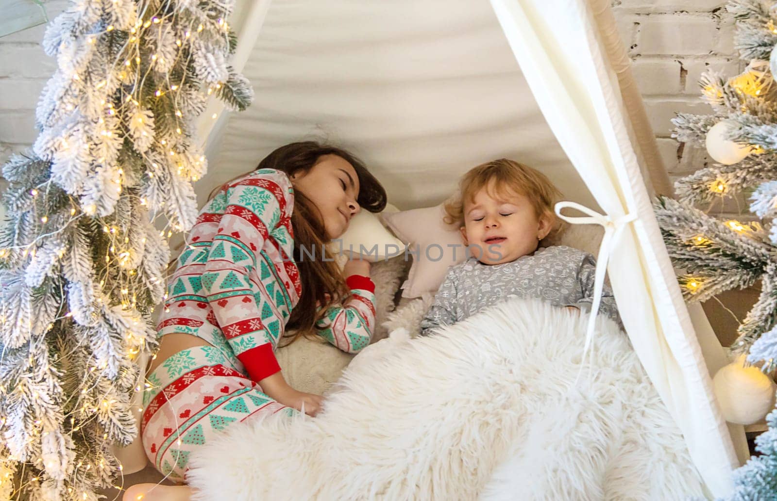 Child in his room decor christmas. Selective focus. Kid.