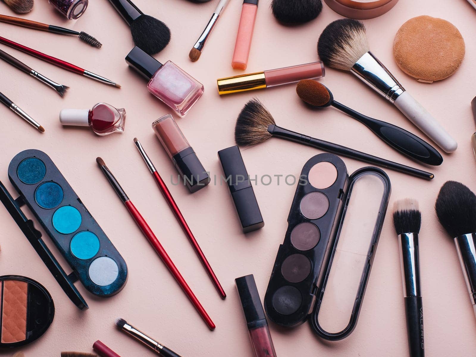 Women's cosmetics and makeup set on pink background. Top view, flat lay collage