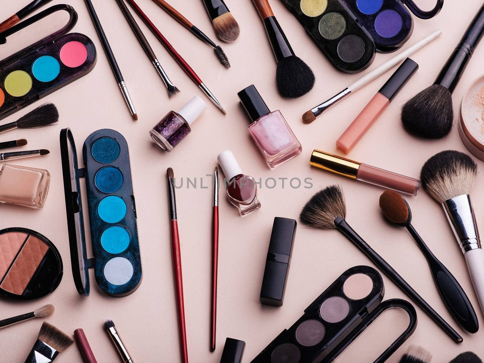Women's cosmetics and makeup set on pink background. Top view, flat lay collage