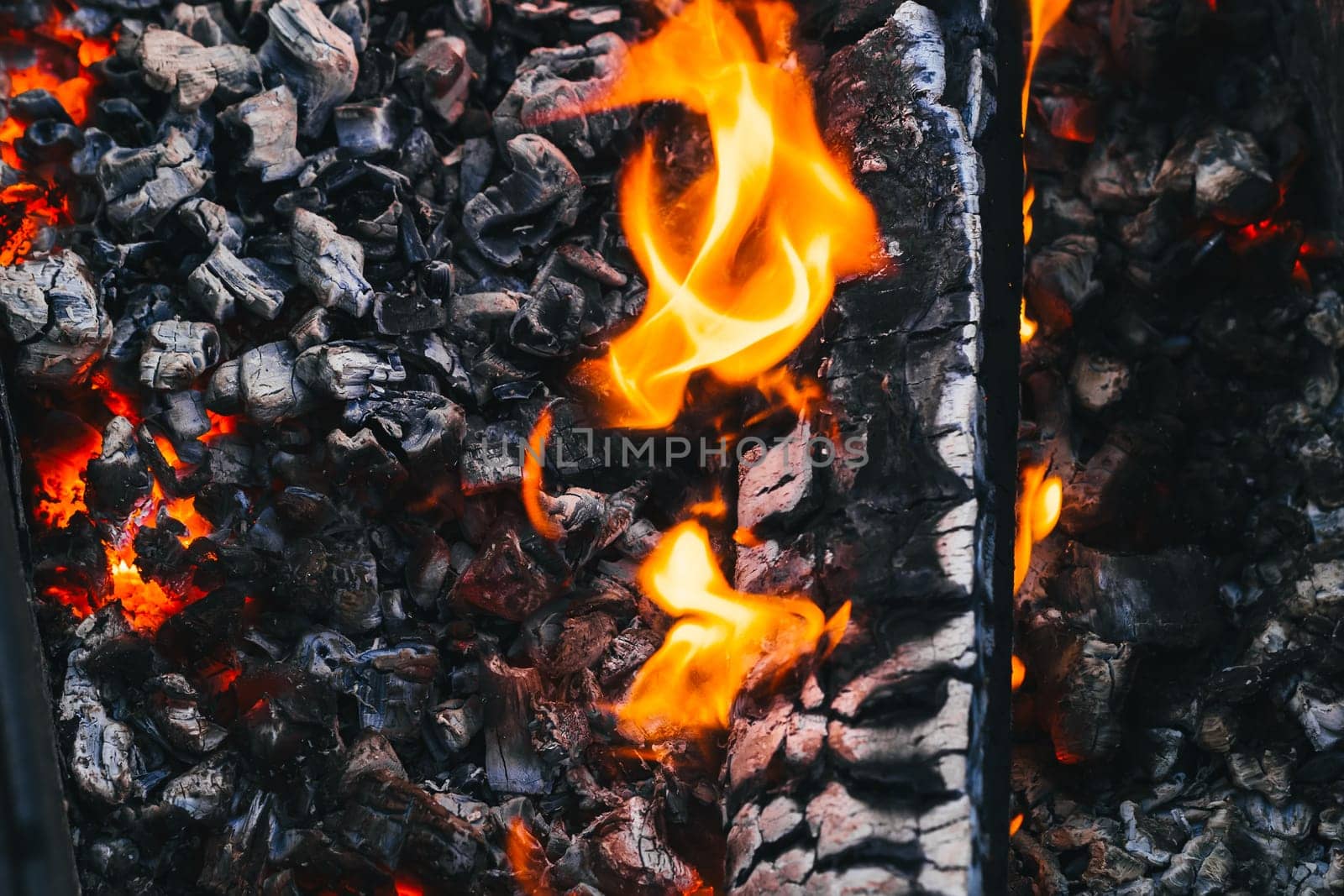 Burning charcoal in the fire for barbecue close-up