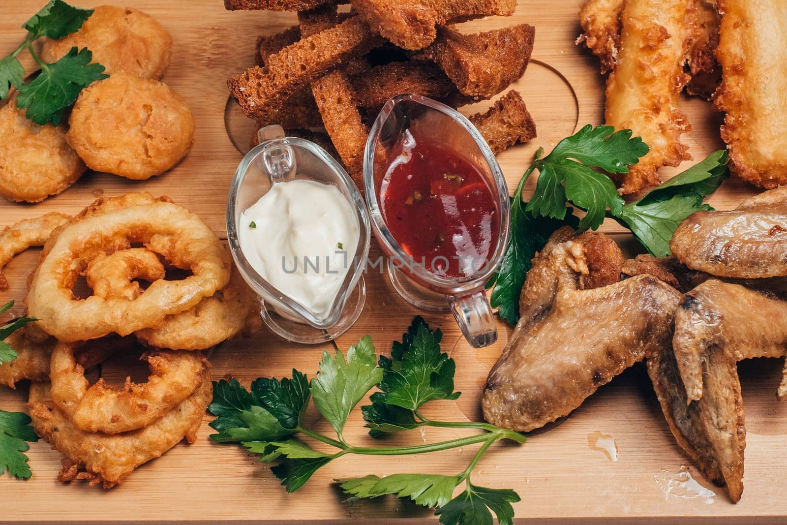 onion rings, crackers, chicken wings and other beer snacks