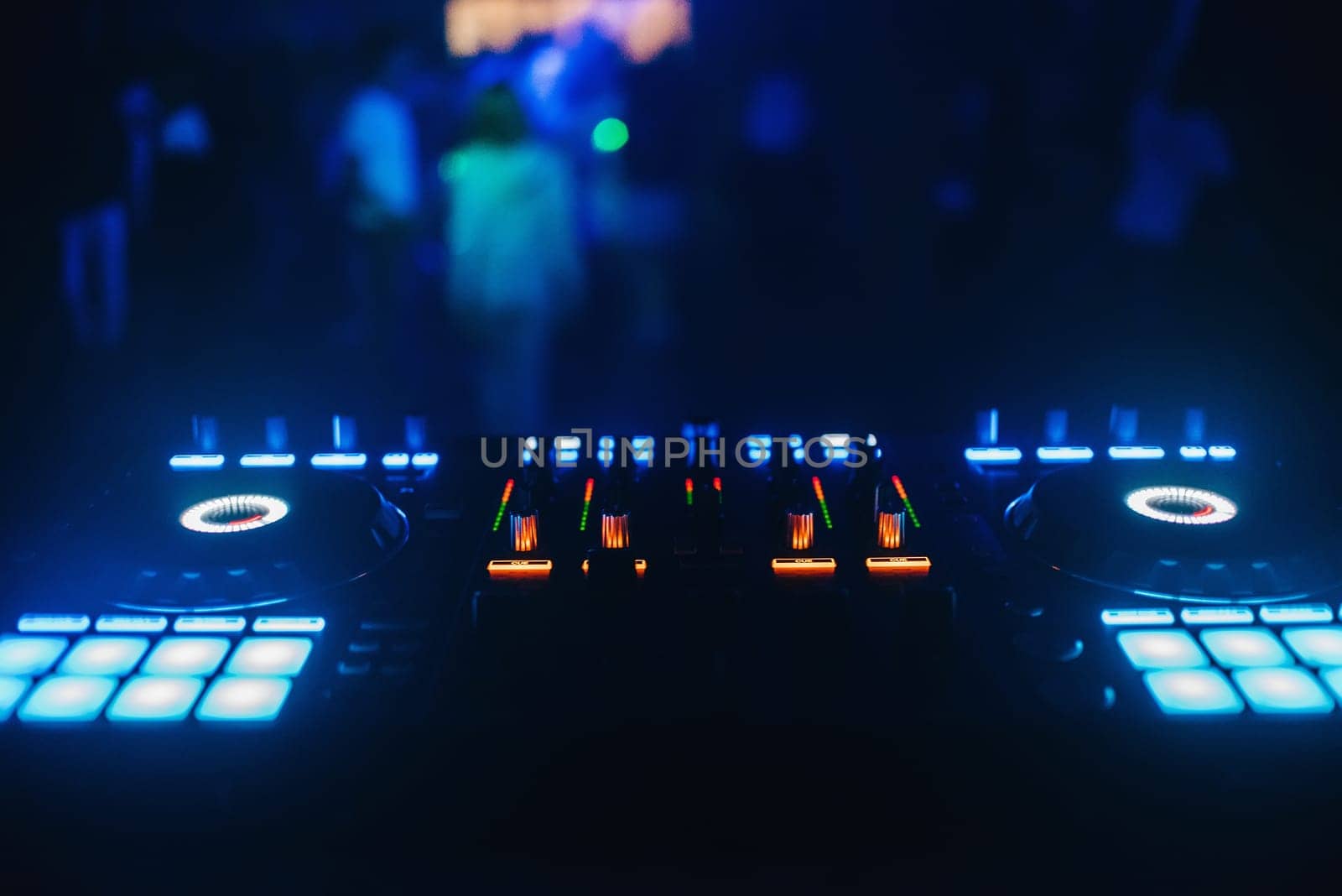 DJ mixer controller panel for electronic music in night club