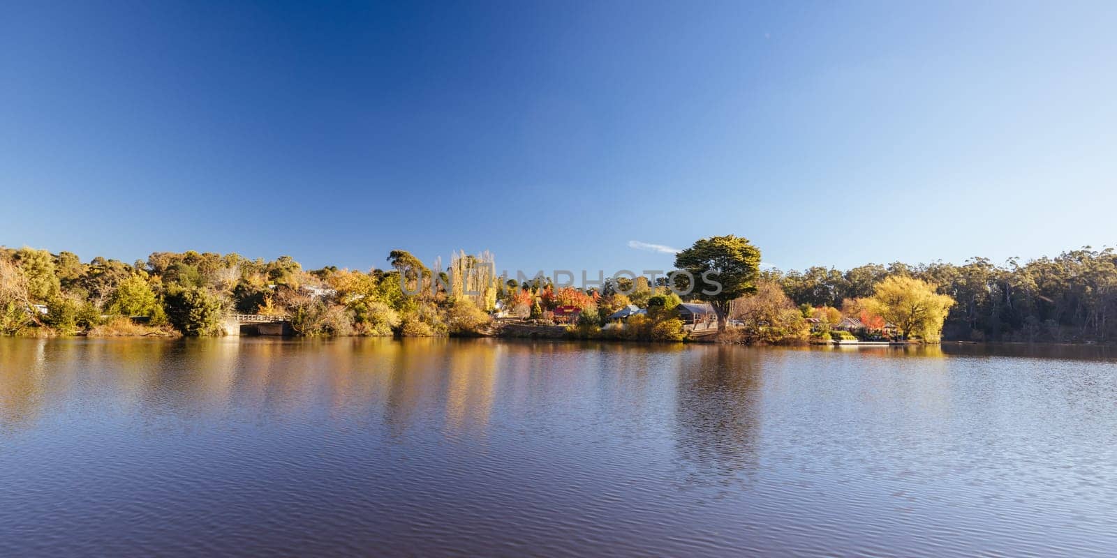 DAYLESFORD, AUSTRALIA - MAY 12 2024: Landscape around Lake Daylesford in a cool late autumn afternoon in Daylesford, Victoria, Australia