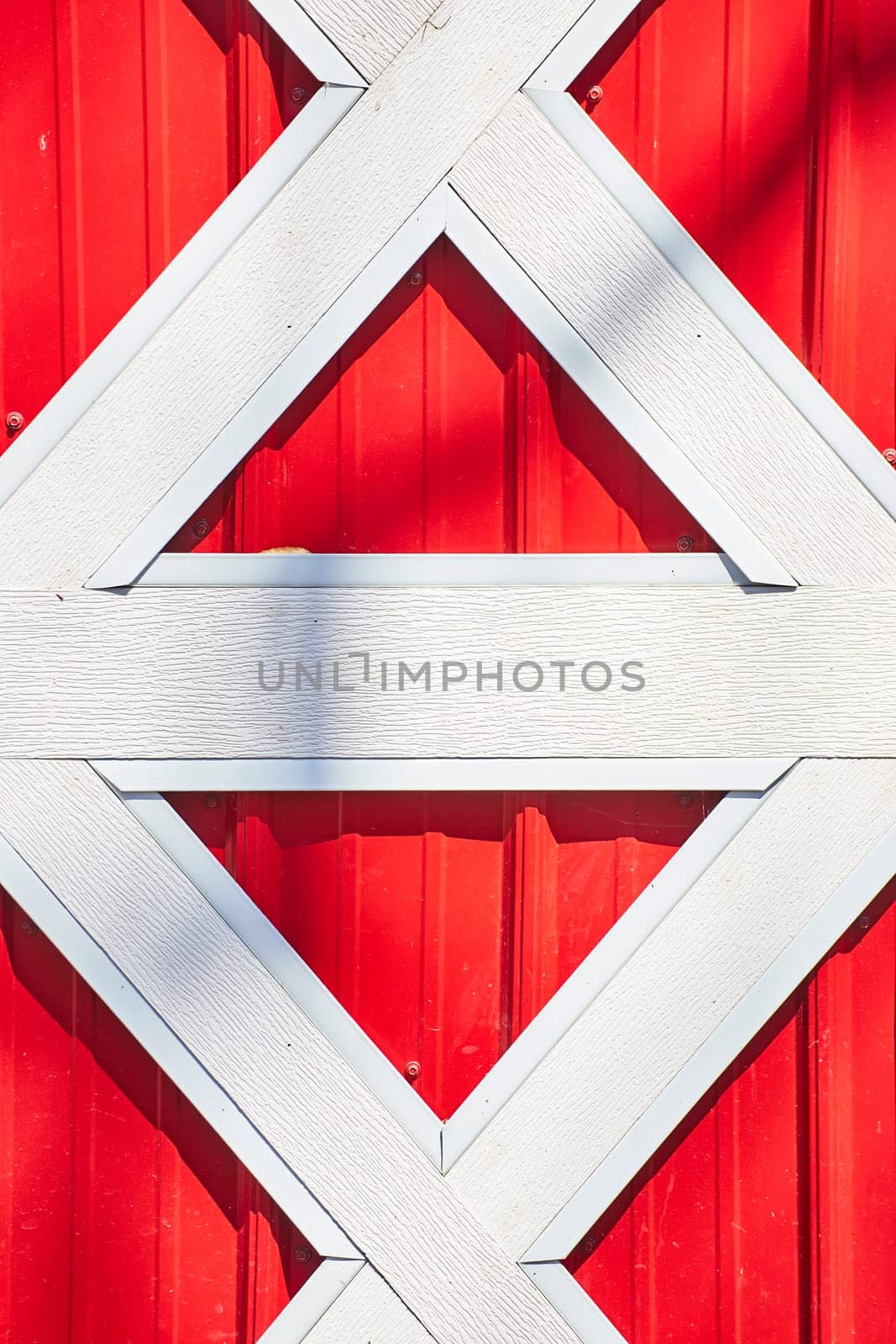 Vivid red and white geometric pattern with eye-catching X and diamond shapes, perfect for bold design projects.