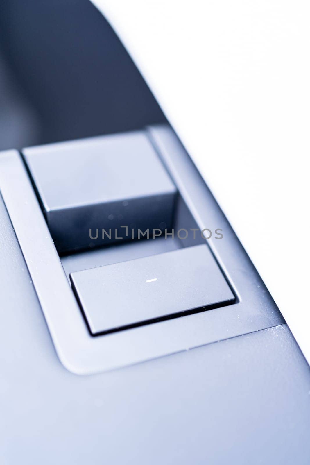 Denver, Colorado, USA-May 5, 2024-This image showcases a close-up view of the sleek window control buttons located on the door of a Tesla Cybertruck. The focus on the minimalist design highlights Tesla commitment to modernity and functionality in their vehicle interfaces.