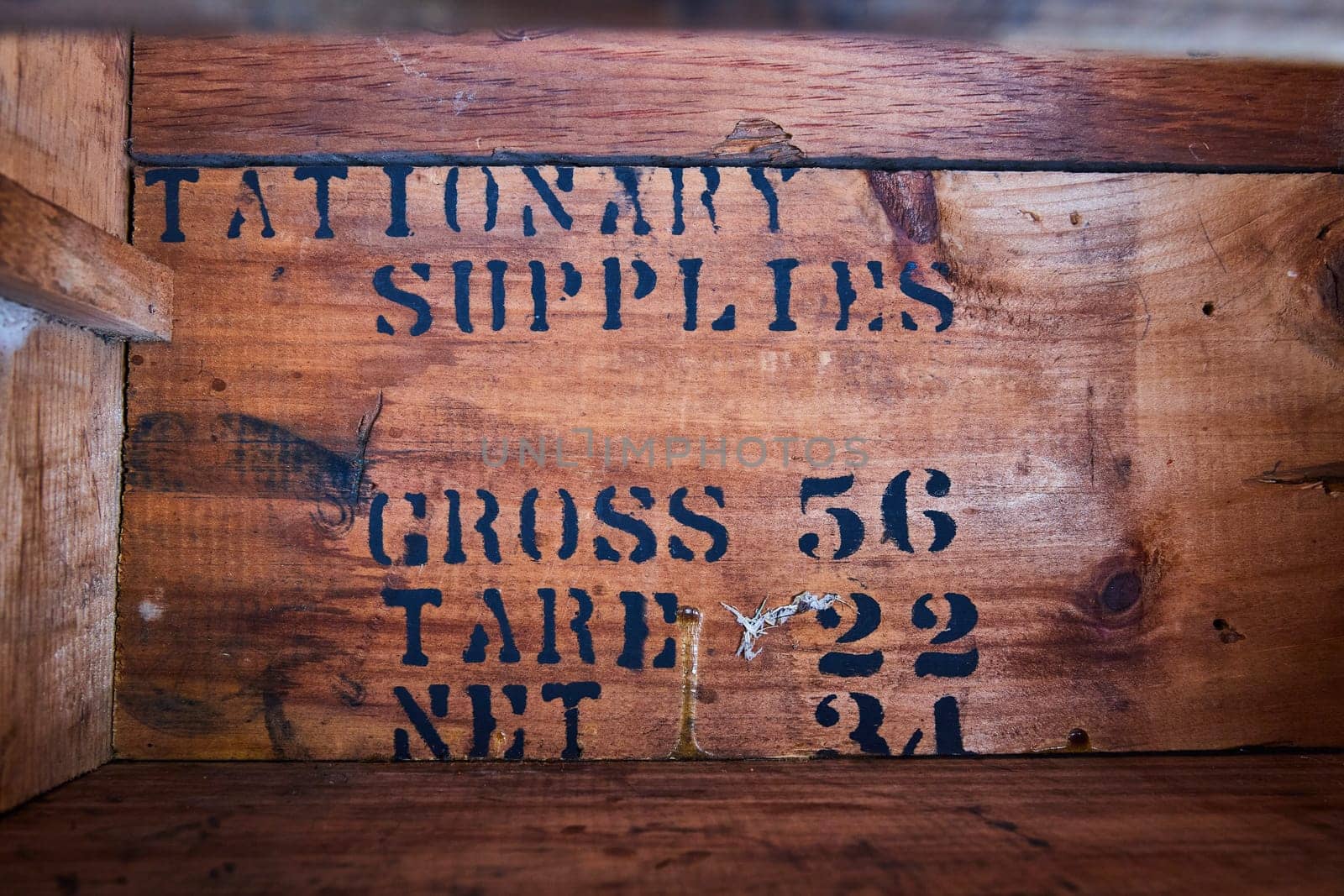 Vintage wooden crate from Hicksville, Ohio, with 'STATIONERY SUPPLIES' text, showcasing antique charm and utility.