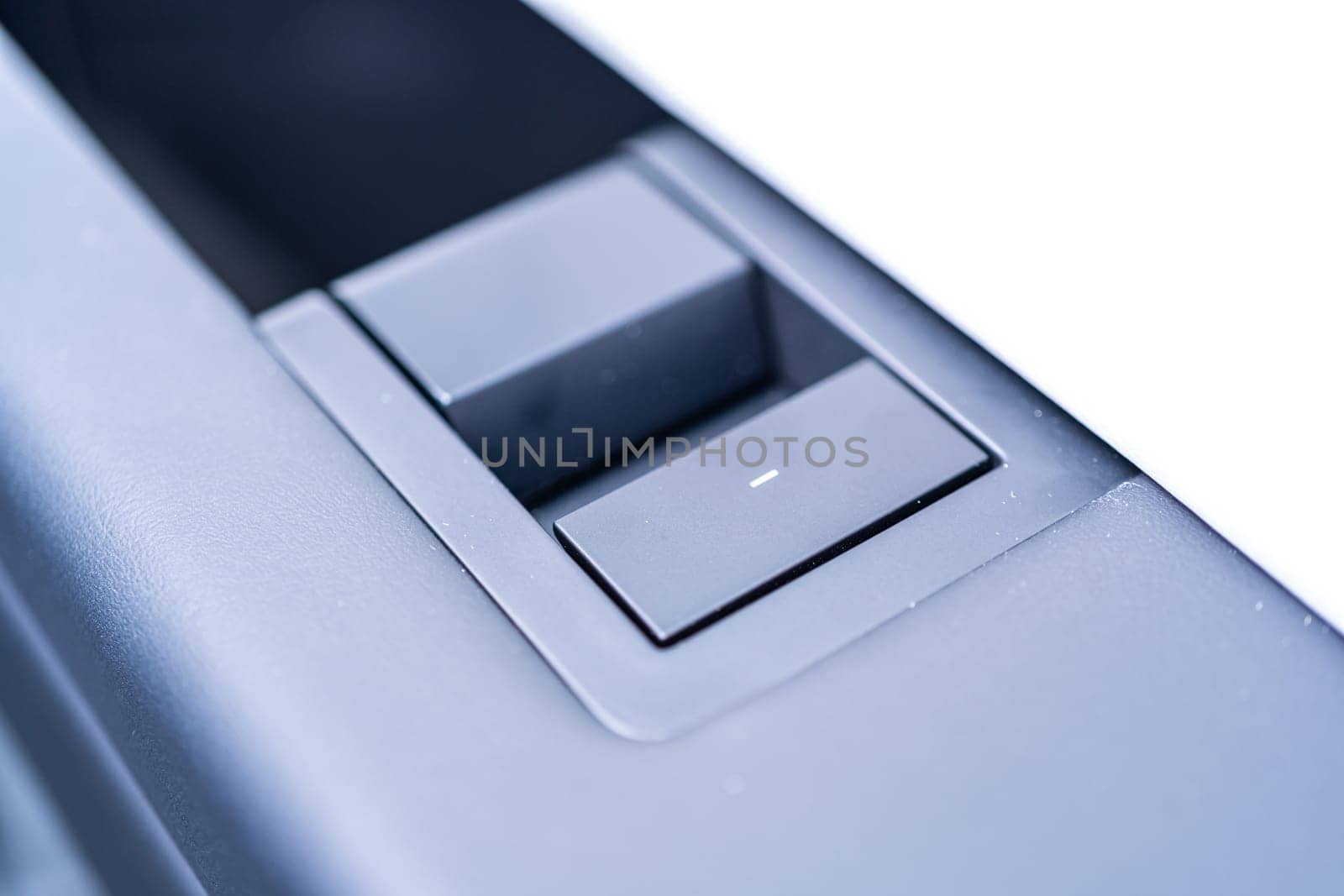 Denver, Colorado, USA-May 5, 2024-This image showcases a close-up view of the sleek window control buttons located on the door of a Tesla Cybertruck. The focus on the minimalist design highlights Tesla commitment to modernity and functionality in their vehicle interfaces.