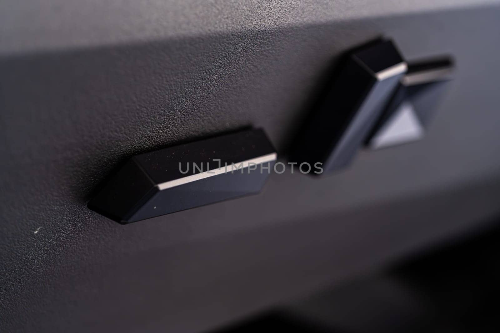 Close-up View of Seat Adjustment Buttons in Tesla Cybertruck by arinahabich