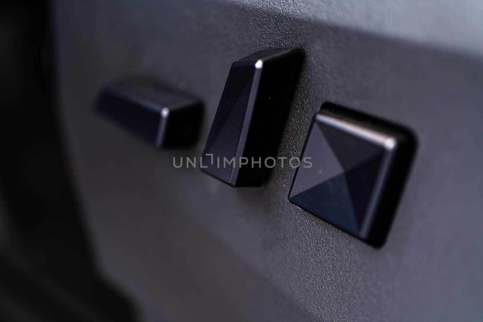 Close-up View of Seat Adjustment Buttons in Tesla Cybertruck by arinahabich