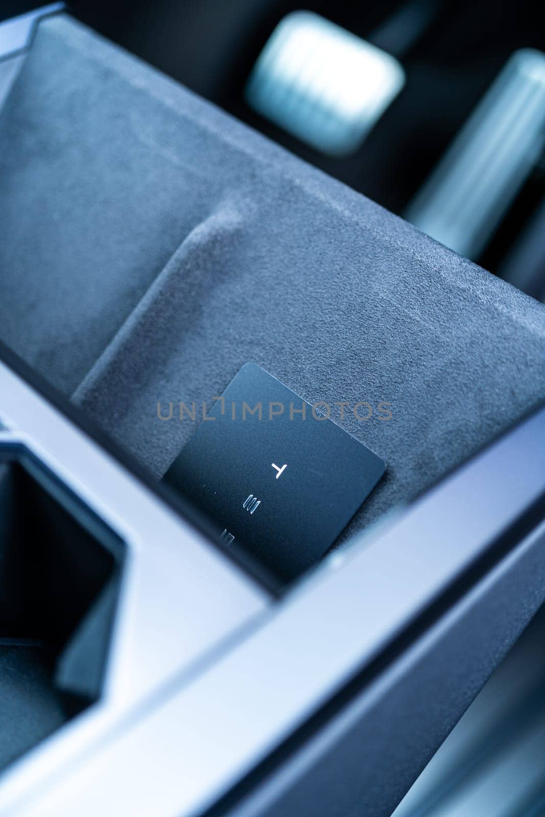 Close-Up of Tesla Cybertruck Key Card in Holder by arinahabich